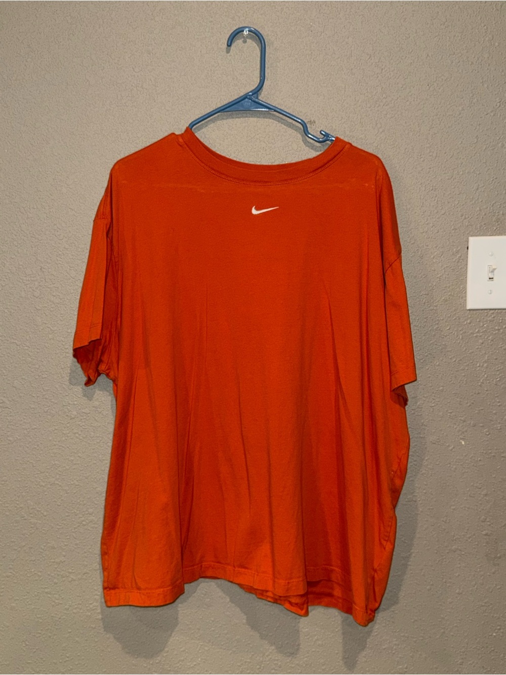 Nike Women’s Loose Fit Orange Short Sleeve Tee with White Swoosh